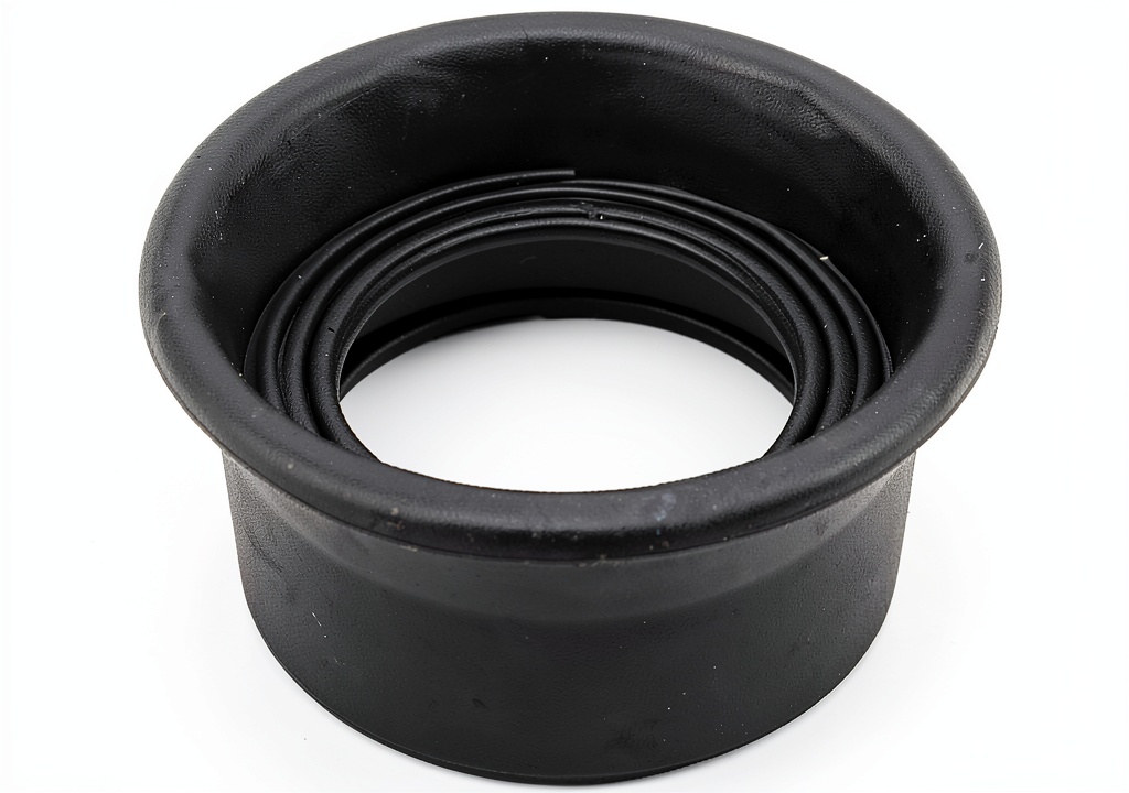 VONNST eyepiece cover being placed on a microscope eyepiece